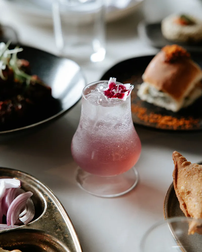 Pink bespoke highball cocktail at Times of India Auckland CBD